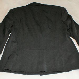Tapered detailing and fully lined. Office Ready, Versatile  Black Blazer Size 6